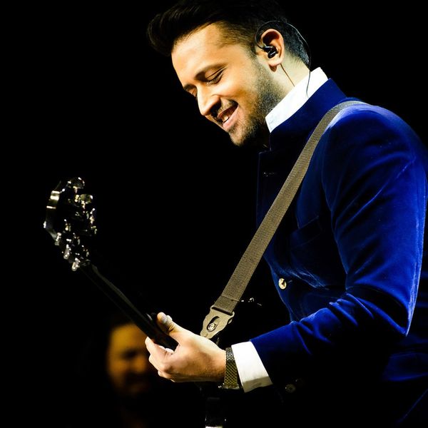 Atif Aslam with his guitar